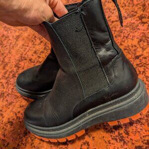 Black Boots with Red Sole